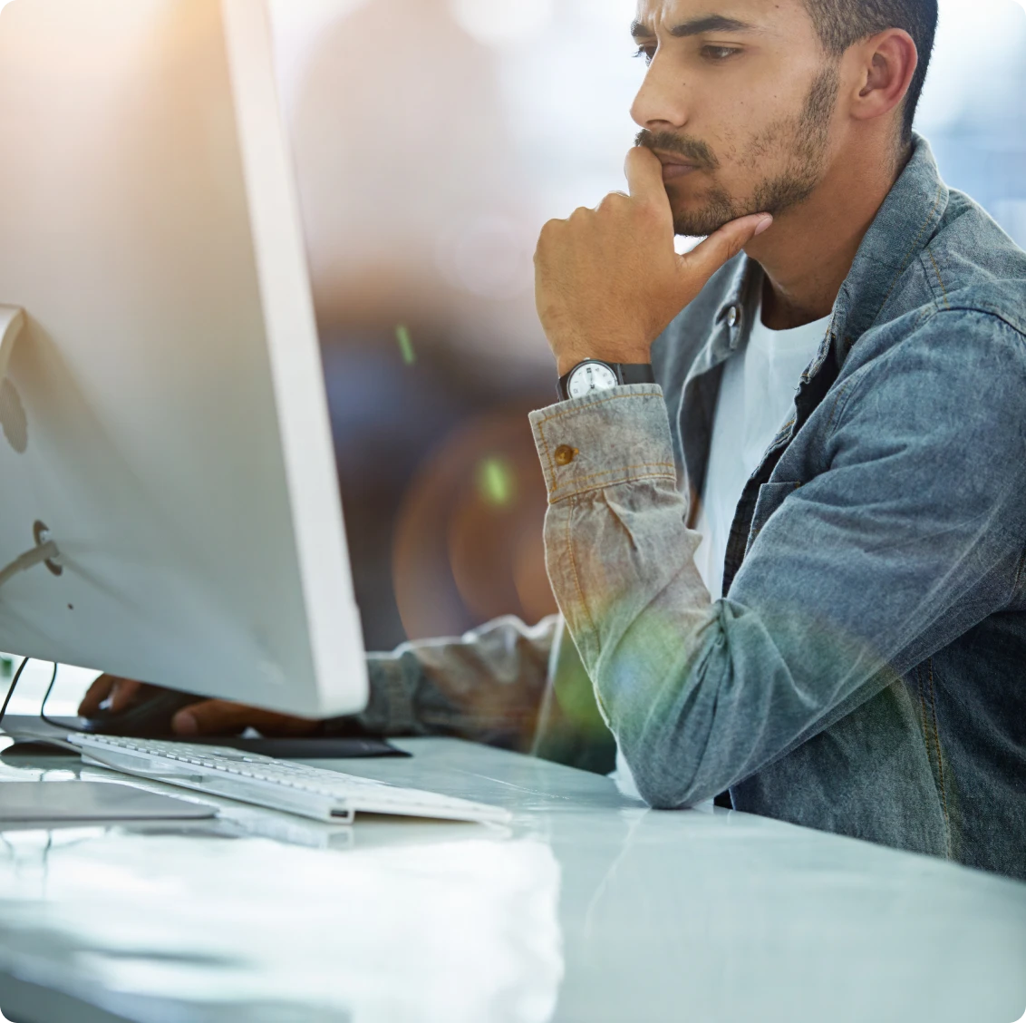 Person focused on computer screen