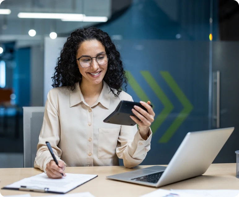 Businesswoman multitasking with technology